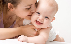 Baby Laughing With Mother